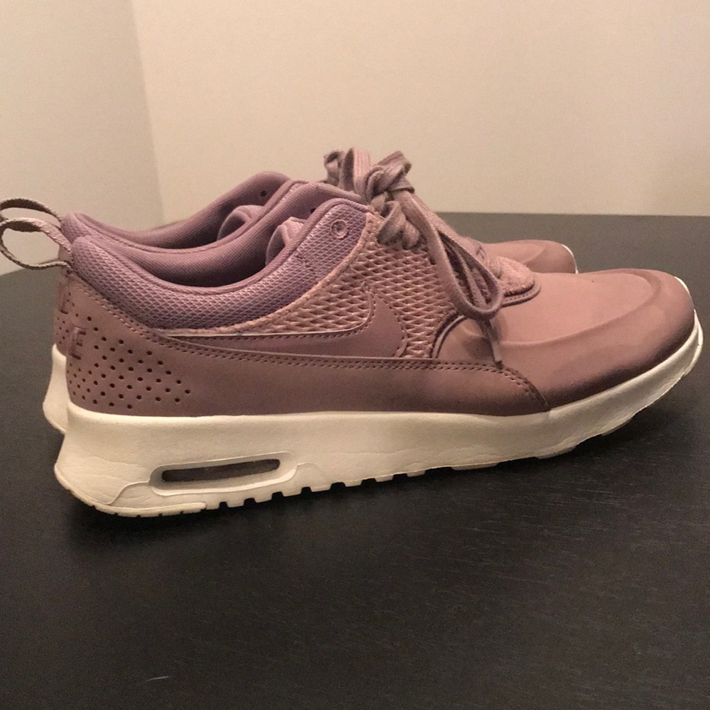 Mauve Nike athletic shoes